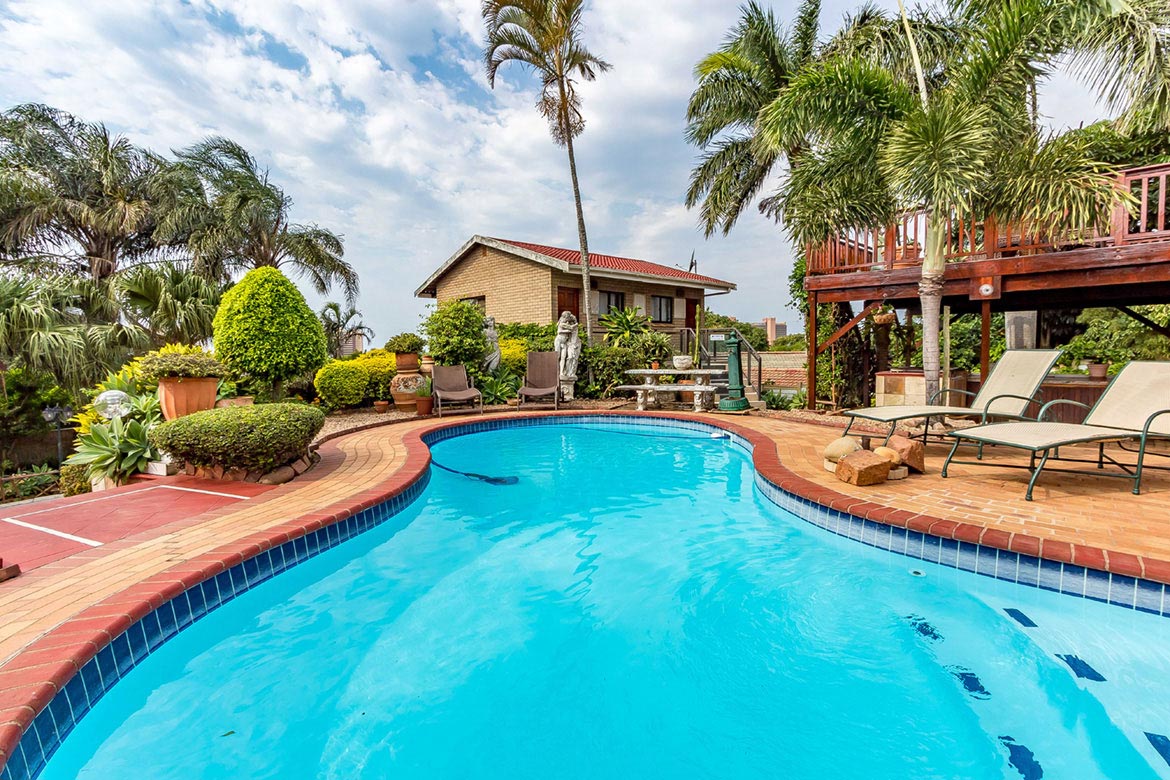 crystal clear blue pool at palm lodge
